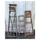 Three wooden ladders