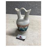 Native American stoneware pottery rides pitcher