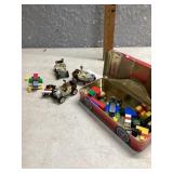 Lego trucks and Coca-Cola tin