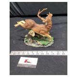 Dear figurine, antler has been  repaired