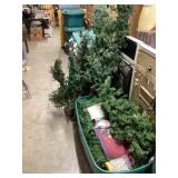 Tote of Christmas items and trees