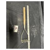 Commercial potato masher