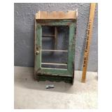 Chippy paint medicine cabinet