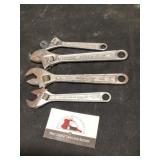 Adjustable wrenches