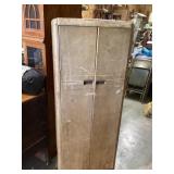 Metal cabinet 24  wide 11 deep 62 tall