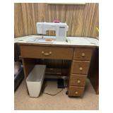 Kenmore sewing machine in stand