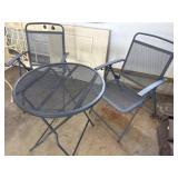 Metal folding table and chairs