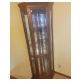 Lighted corner curio cabinet