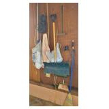 Wall of shovels, brooms, etc