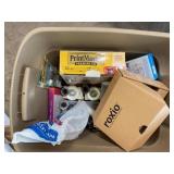 Tote of office supplies