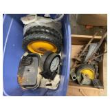 Tote of pedal tractor parts