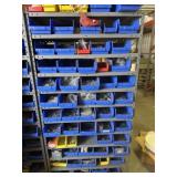 Plastic parts bins on metal shelving with hardware