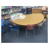Kidney shaped table and six chairs 72 x 35 bring
