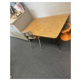 Adjustable table approximately 48 x 30 and one