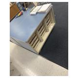 Rolling storage unit 48 x 25 1/2 x 29 contents