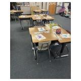 21 desks and chairs bring help to load without
