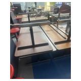 Five adjustable tables approximately 6 foot tall