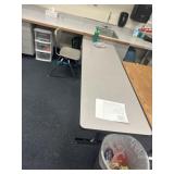 Approximately 8 foot long adjustable table