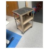 Metal cart located in lunchroom