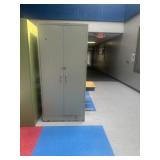 Metal cabinet located in lunchroom