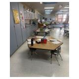 Six clusters adjustable tables and chairs.