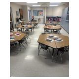 Six clusters of adjustable tables and chairs