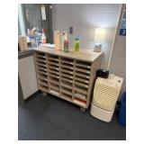 Rolling shelf unit 38 1/2, 21 x 21 x 36 contents