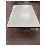 Adjustable table 40 x 60 and four chairs