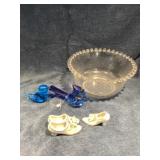 Blue glass birds and shoes marked Japan
