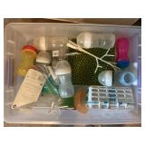 Tote of baby bottles and misc