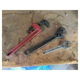 Adjustable wrenches
