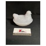 Small White Hen on a Nest