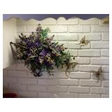 Artificial flower arrangement and butterfly decor