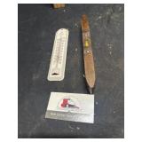 Metal thermometer, and wooden level