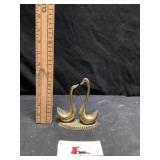 Brass swans