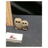 Carved stone owls