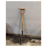 vintage 4-tine hay or potato fork with a wooden