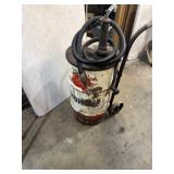 vintage Mobil oil lubester, a type of drum pump