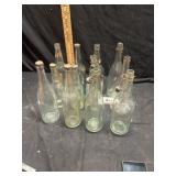 12 vintage bottles