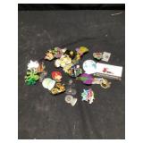 28. Lapelle pins.