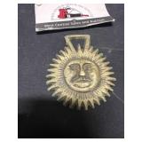 Metal Sun medallion