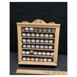 Shelves of miscellaneous golf balls