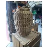 Wicker basket, approximately 30 inches tall
