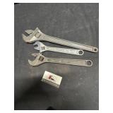 Adjustable wrenches