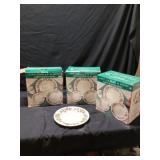 New 16 piece Holly and bird dinnerware 3 sets