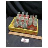Collector Coca-Cola bottles with carrying case