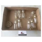 Glass bottles and flower frog