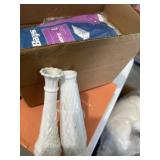 Vacuum bags and milk glass vases