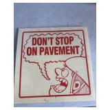 Plastic donï¿½t stop in pavement sign