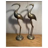 Brass flamingos
